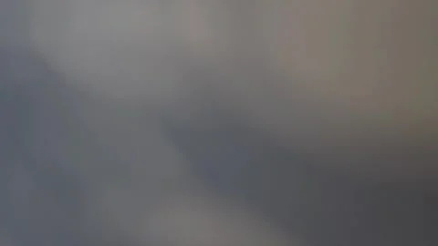 Defocused shadows from tree leaves on gray background moving on a windy weather Stock-Footage 300377298