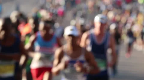 Defocused shot of athletes running towards camera Stock Footage 24689846