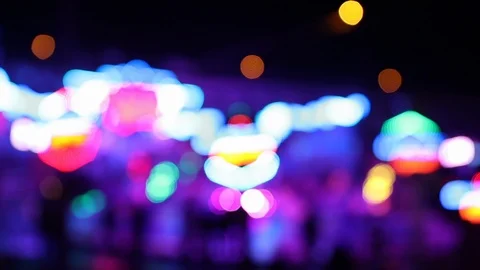 Defocused shot of carnival carousel in motion with lights Stock Footage 120527545
