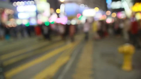 Defocused shot of a fast paced Asia city at night Stock Footage 3223030