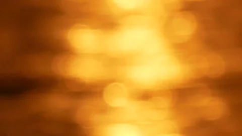 Defocused shot of small ripple wave in sea, shiny sparkling sunlight reflecti Stock Footage 130578461