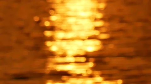 Defocused shot of small ripple wave in sea, shiny sparkling sunlight reflecti Stock Footage 130578519