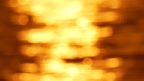 Defocused shot of small ripple wave in sea, shiny sparkling sunlight reflecti Stock Footage 130578536