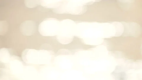 Defocused shot of small ripple wave in sea, shiny sparkling sunlight reflecti Stock Footage 130583891