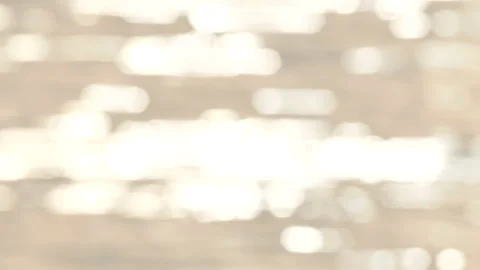 Defocused shot of small ripple wave in sea, shiny sparkling sunlight reflecti Stock Footage 130584146