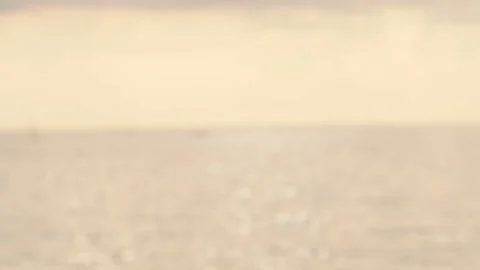 Defocused shot of small ripple wave in sea, shiny sparkling sunlight reflecti Stock Footage 130584826