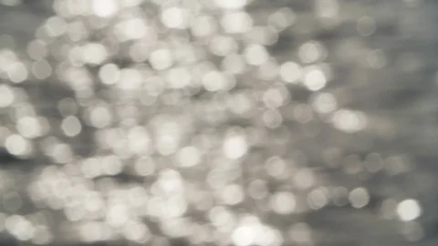 Defocused shot of sun reflection glistening on water surface of Shambhavi river Stock Footage 145043645