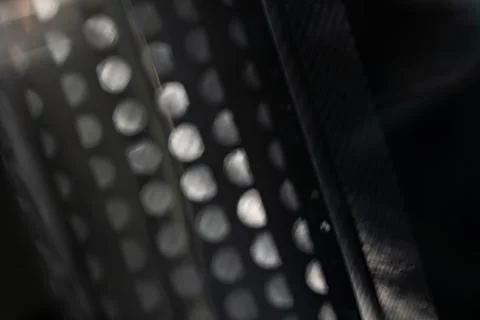 Defocused silver mesh lights with diagonal dark bands and soft geometric bo.. 스톡 사진