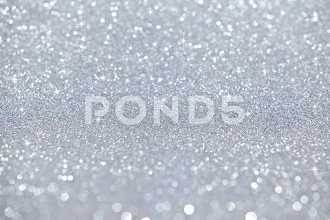 Defocused Silver Sparkle Background Stock Photos