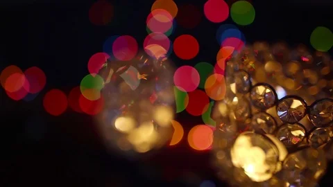 Defocused sparkling lamp and lots of colorful lights on a background in a dark 库存影片 99549978