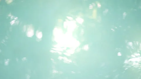 Defocused Sun Glare and Trees Reflections on Water Surface of the Pool Video stock 200340619