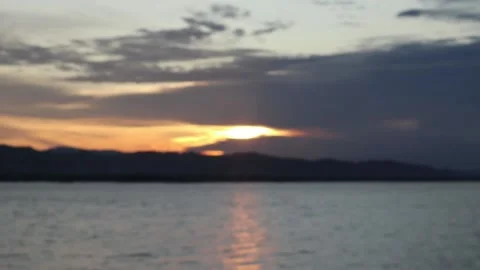 Defocused on sunset on the lake Stock Footage 220018770