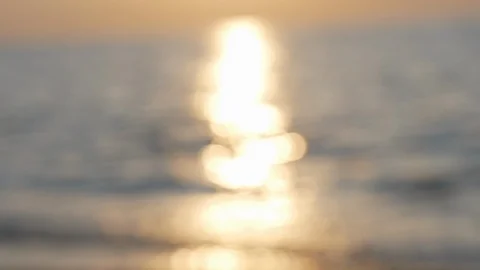 Defocused sunset on sea wave Stock Footage 126936509