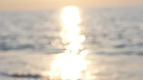 Defocused sunset on sea wave Stock Footage 126936914