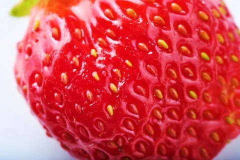 Defocused texture of strawberry, macro background. Closeup top view. Selectiv 스톡 사진