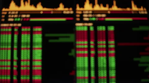 Defocused trading exchange graph on screen with stock values going up and down Stock Footage 167655748