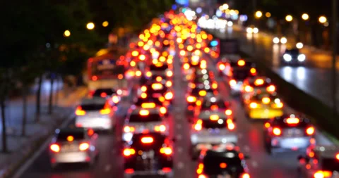 Defocused traffic jam, river of red lights on Bangkok road at night Видео 326388438