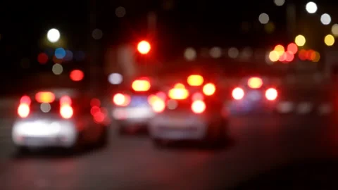 Defocused traffic lights at night Vídeo Stock 167662661