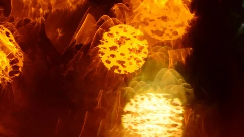 Defocused traffic lights through wet car glass. Stock Footage 73619888