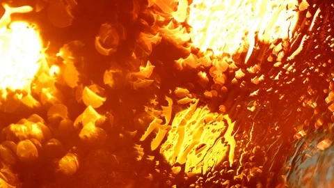 Defocused traffic lights through wet car glass. Stock Footage 73620185