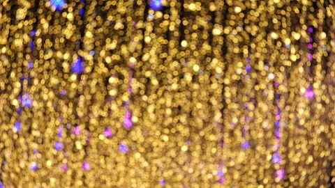 Defocused vertical LED garlands at night. Blurred glowing golden lights. Stock Footage 231424831