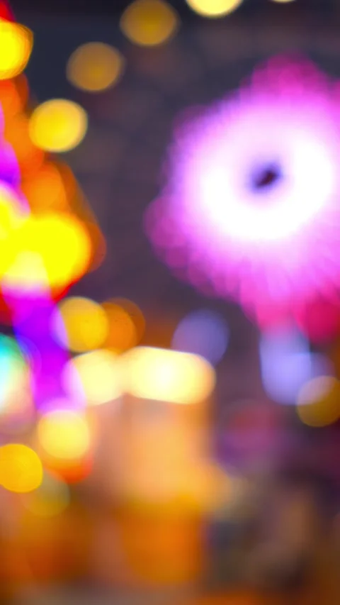 Defocused video of colorful and variable lighting as background at vertical Stock Footage 265358236