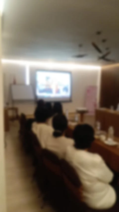 Defocused video of A people group seated in a conference room, attentively Stock Footage 340533828