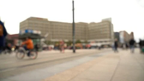 Defocused view of busy public square during the day Stock Footage 123407505
