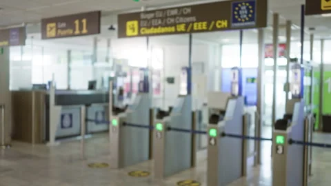 Defocused view of an empty airport terminal showing automated passport cont.. Vídeo Stock 301688429