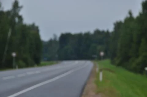 Defocused view of the highway. Stock Photos