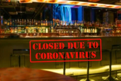 Defocused view of interior of modern pub, empty and closed due to coronavirus Stock Photos