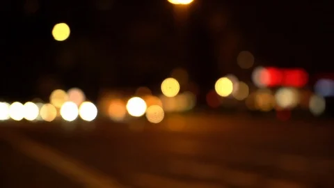 Defocused view of traffic on city intersection Stock Footage 123901116