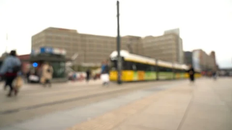 Defocused view of tram station in Berlin with tram leaving Stock Footage 120930005