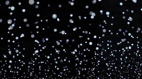 Defocused white bokeh on a dark background Video stock 226096974