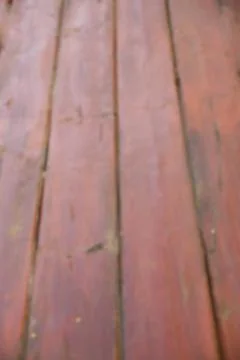 Defocused wooden table background Stock Photos