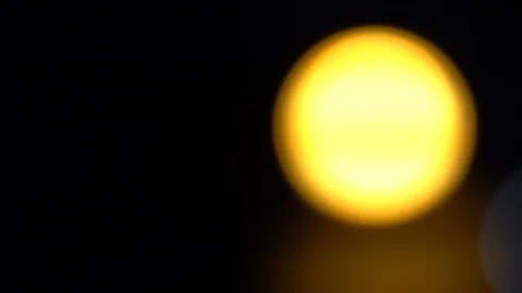 Defocused yellow circles light effects, abstract blurred motion boche background Video stock 93398088