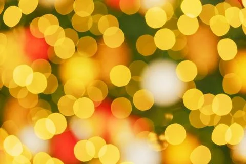 Defocusing effect in the form of bright yellow circular bokeh. Bokeh on the Stock Photos