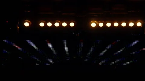 Defocusing flood disco lights flashing in the dark Stock Footage 65202013