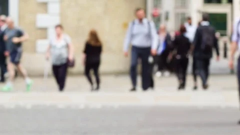 Defocussed commuters leaving offices at rush hour in London England Video stock 77168415