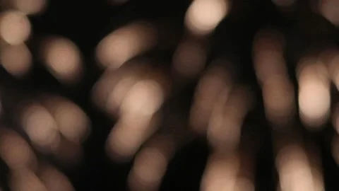 Defocussed spheres of light floating in mid air. Elegant and ethereal Stock Footage 291535062