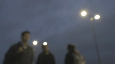 Defocussed view of commuters at rush hour at dusk on london bridge Stock Footage 96361502