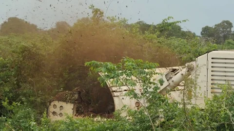 Deforestation machine eliminate bush 4K Stockbeeldmateriaal 71289764