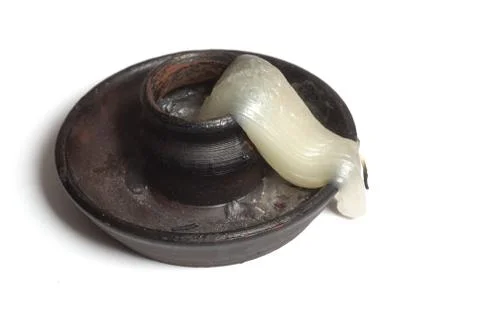 Deformed candle-end Stock Photos