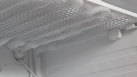 Defrosting the refrigerator from ice . Stock Footage 245304933