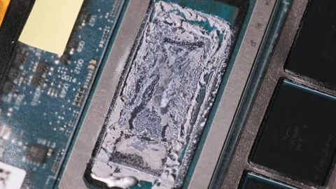 Degraded Thermal Paste on a CPU Processor Macro View Stock Footage 314129675