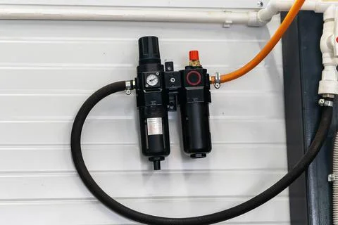 Dehumidifier and flow meter on the compressed air line Stock Photos