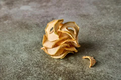 Dehydrated apples chips top view Stock Photos