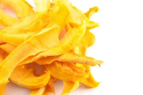 Dehydrated Mango Slices on a White Background Stock Photos