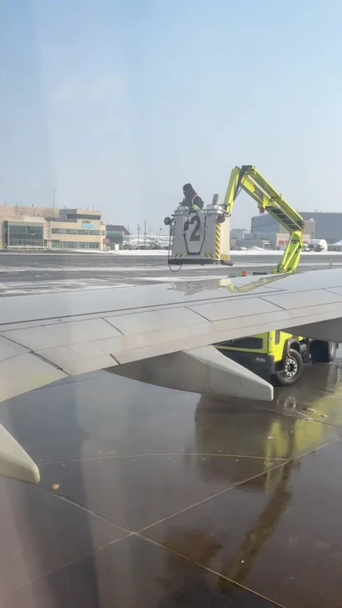Deicing Agent moving away from a plane Stock-Footage 330138792