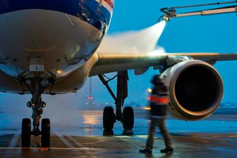 Deicing of the airplane Stock Photos